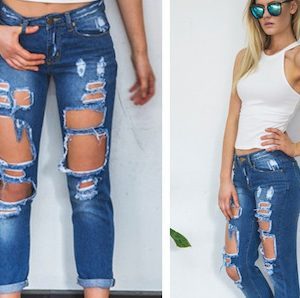 The fitting jeans with big holes